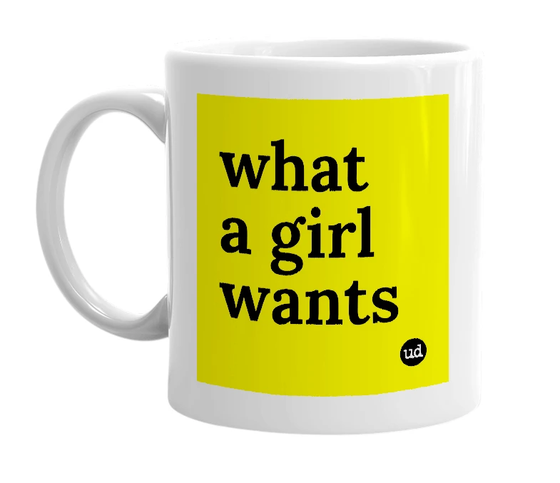 White mug with 'what a girl wants' in bold black letters