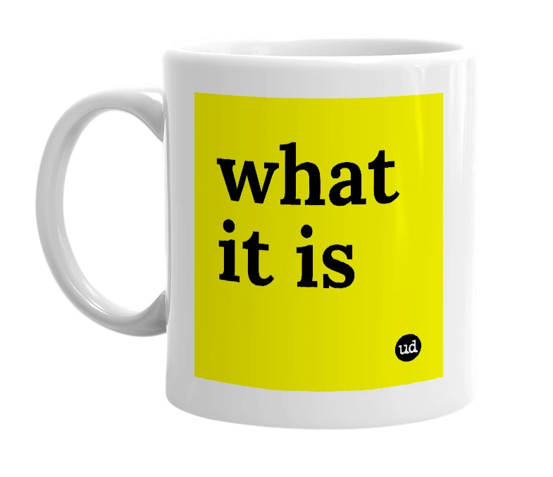 White mug with 'what it is' in bold black letters