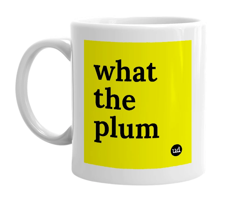 White mug with 'what the plum' in bold black letters