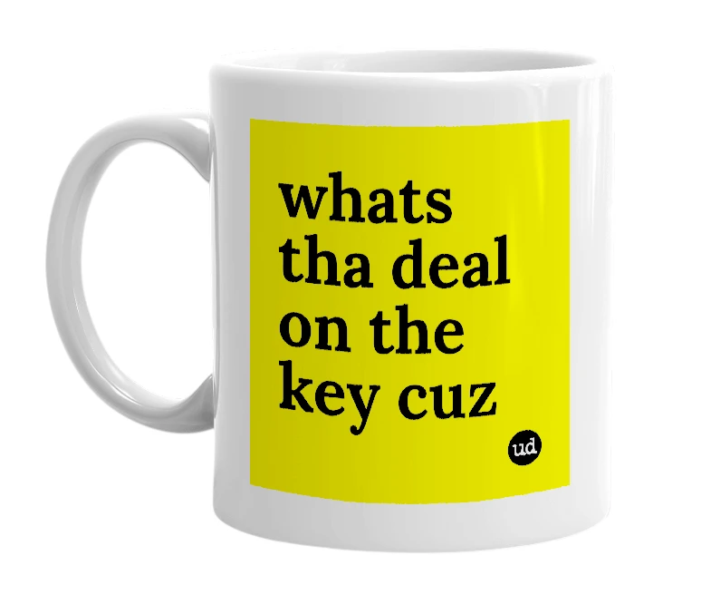 White mug with 'whats tha deal on the key cuz' in bold black letters