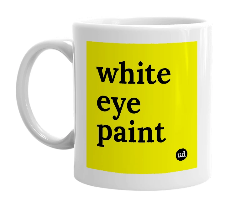 White mug with 'white eye paint' in bold black letters