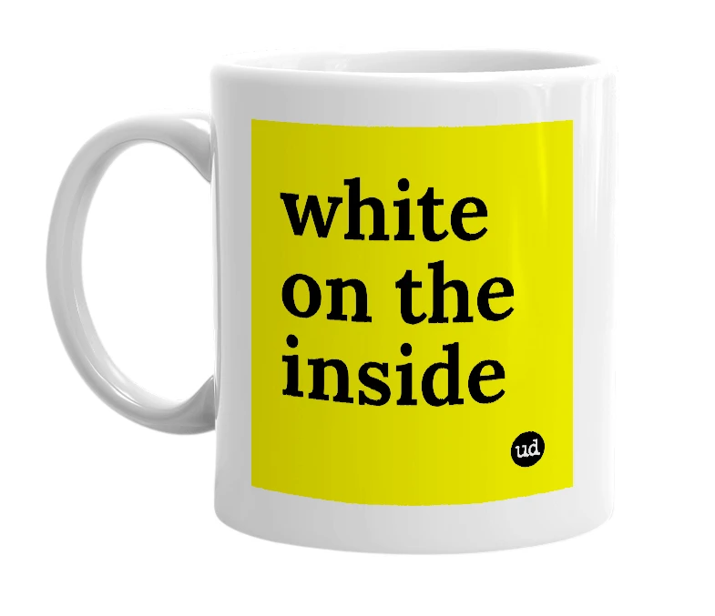 White mug with 'white on the inside' in bold black letters