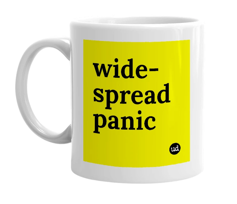 White mug with 'wide-spread panic' in bold black letters