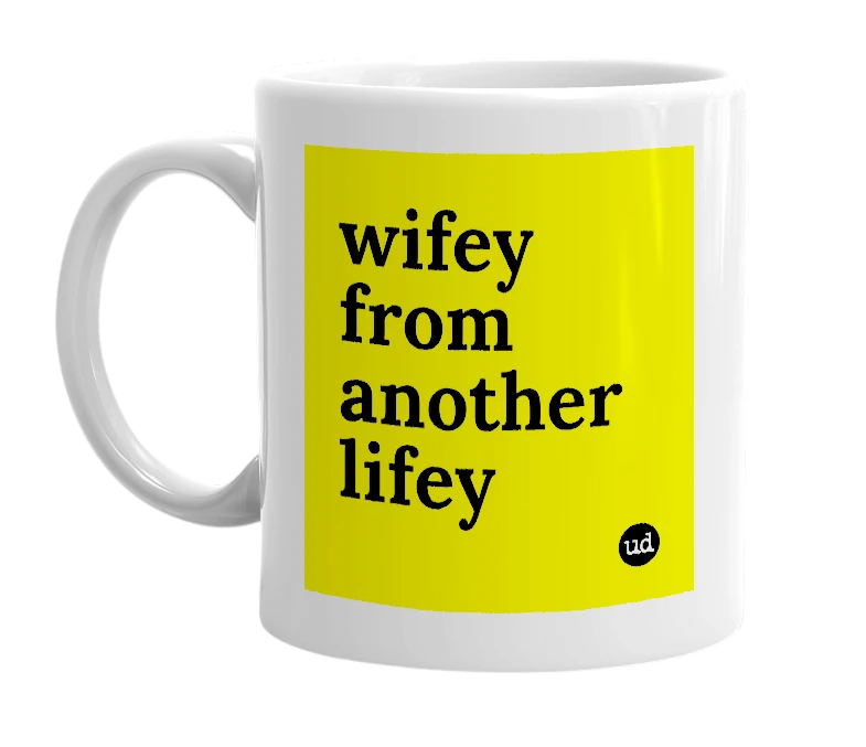 White mug with 'wifey from another lifey' in bold black letters