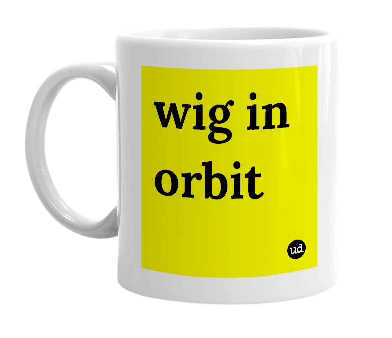 White mug with 'wig in orbit' in bold black letters