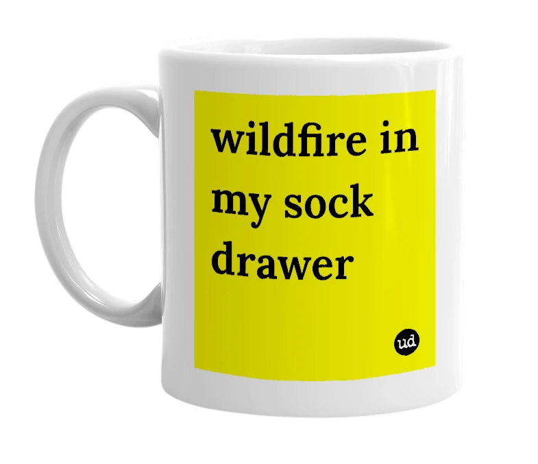 White mug with 'wildfire in my sock drawer' in bold black letters