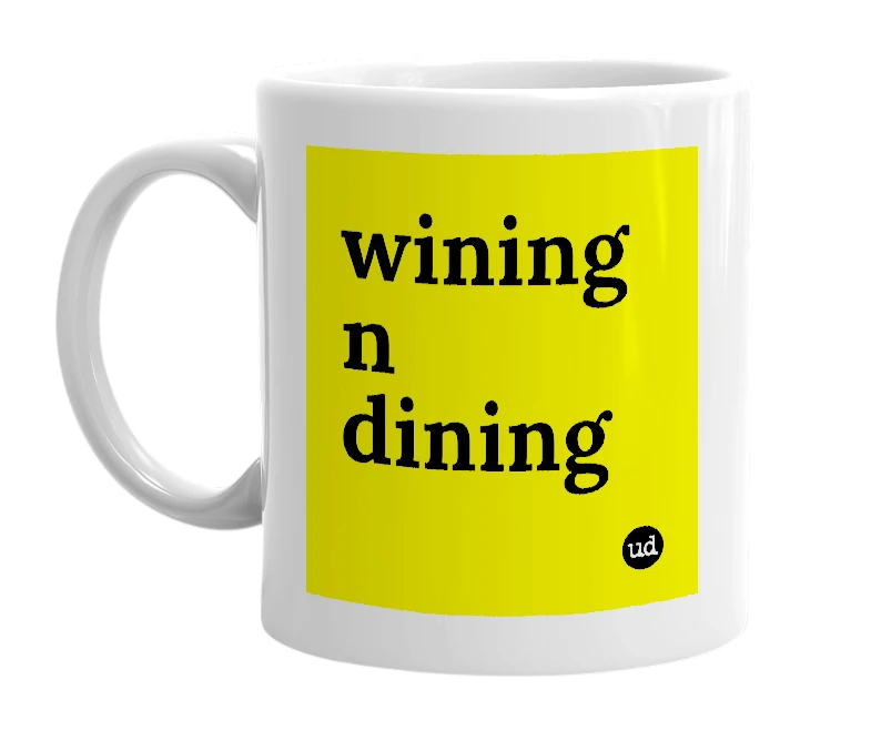 White mug with 'wining n dining' in bold black letters