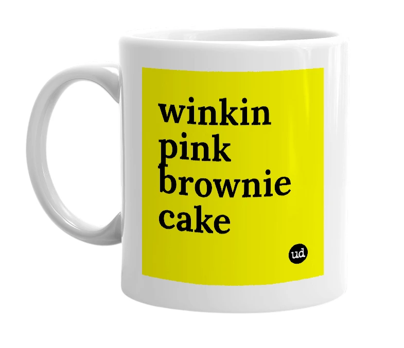 White mug with 'winkin pink brownie cake' in bold black letters