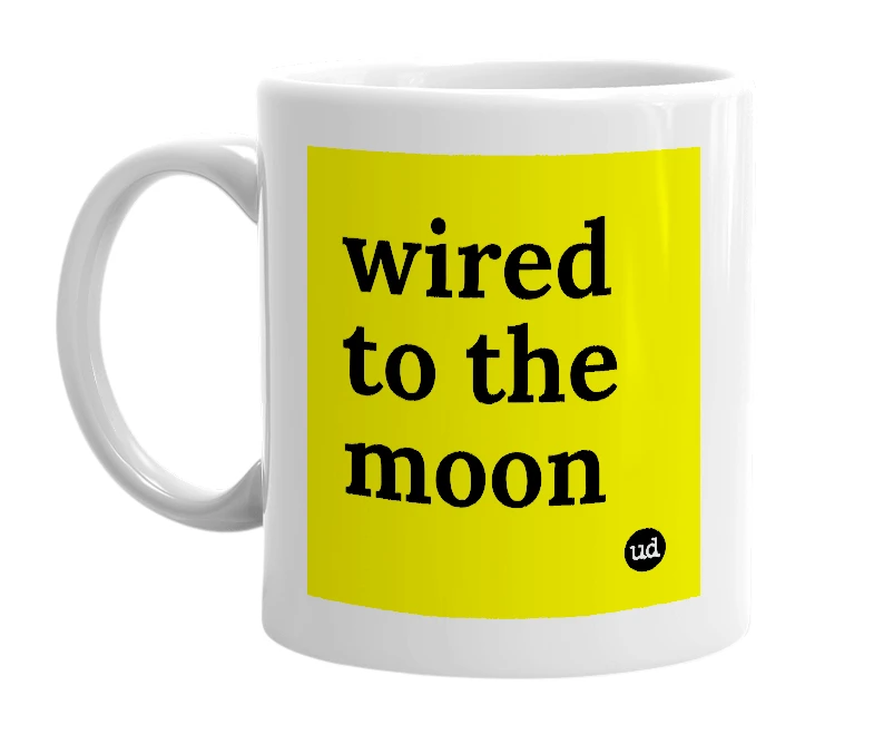 White mug with 'wired to the moon' in bold black letters
