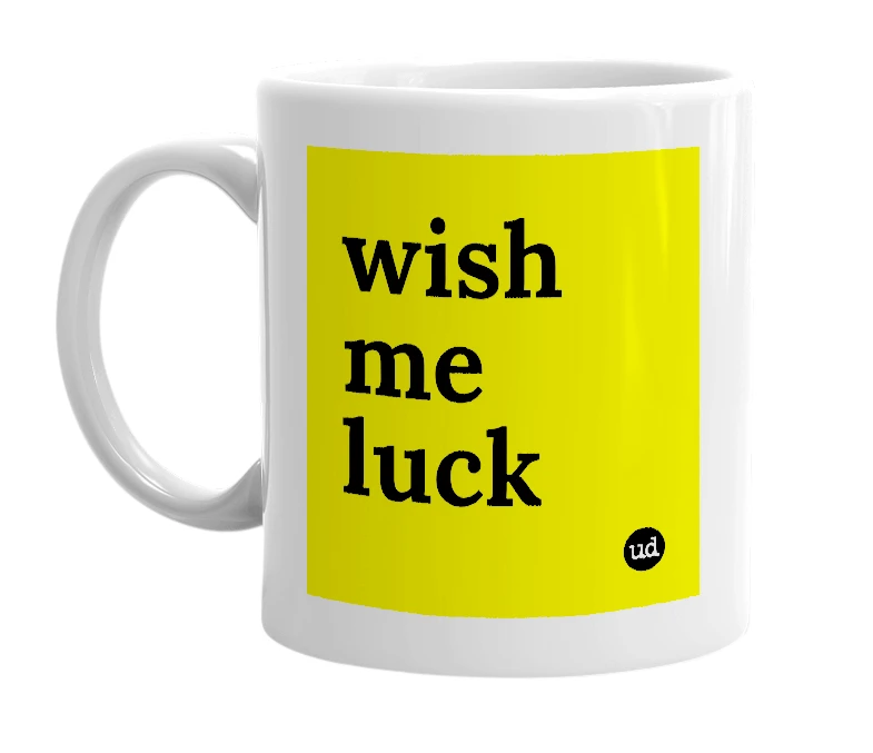 White mug with 'wish me luck' in bold black letters