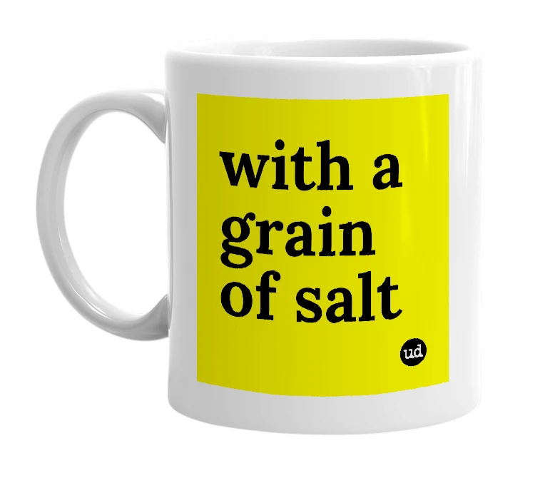 White mug with 'with a grain of salt' in bold black letters