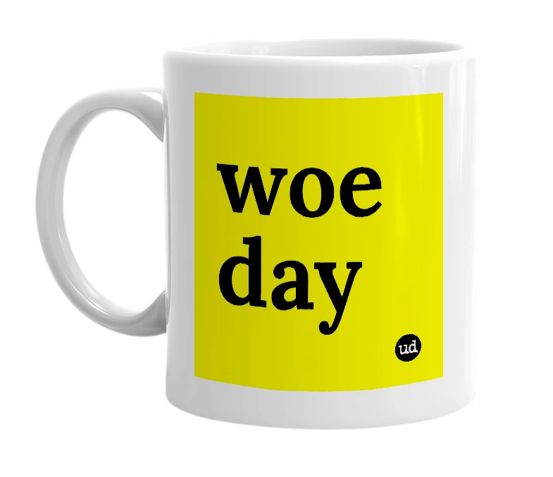 White mug with 'woe day' in bold black letters