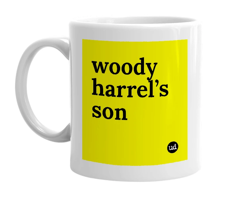 White mug with 'woody harrel’s son' in bold black letters