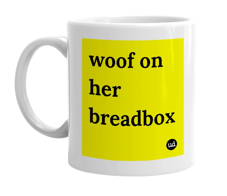 White mug with 'woof on her breadbox' in bold black letters