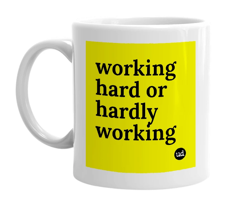 White mug with 'working hard or hardly working' in bold black letters