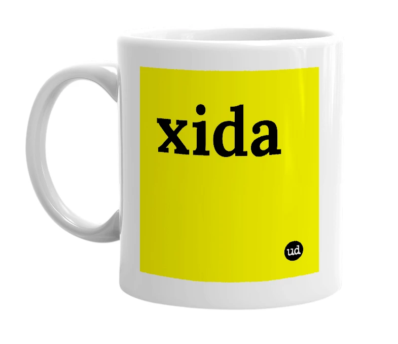 White mug with 'xida' in bold black letters