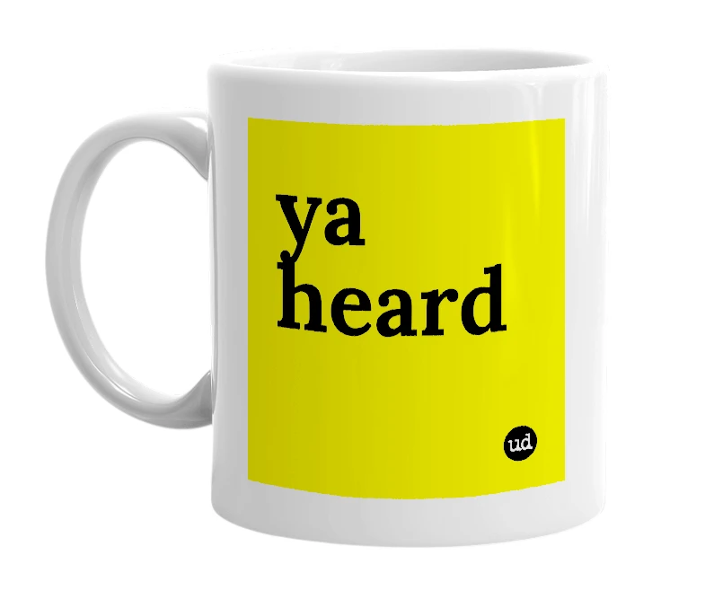 White mug with 'ya heard' in bold black letters