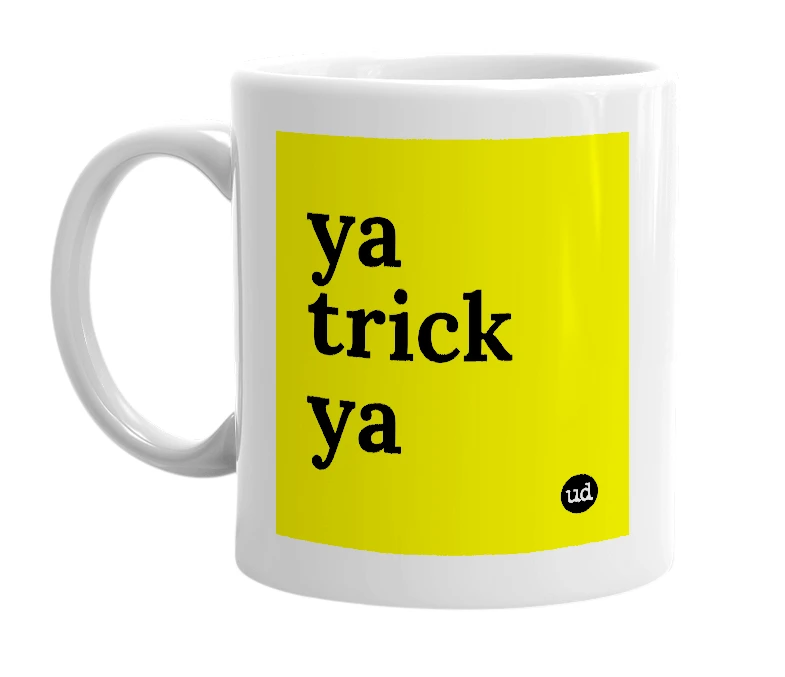 White mug with 'ya trick ya' in bold black letters