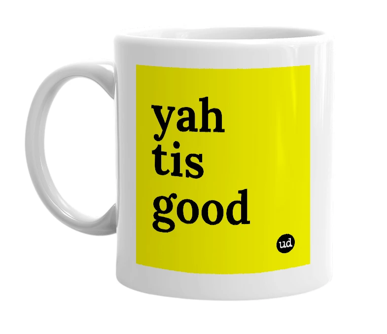 White mug with 'yah tis good' in bold black letters