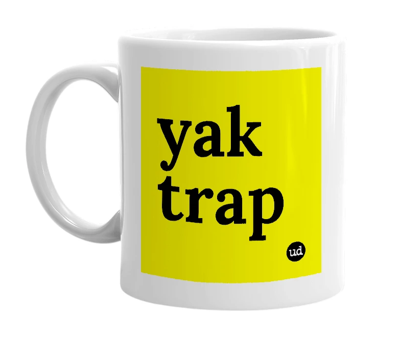 White mug with 'yak trap' in bold black letters