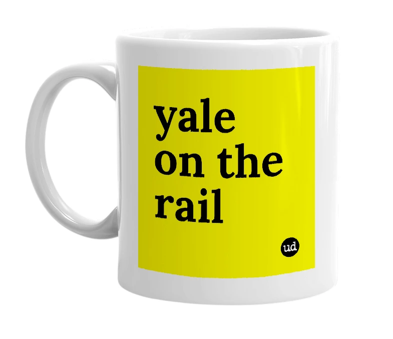 White mug with 'yale on the rail' in bold black letters