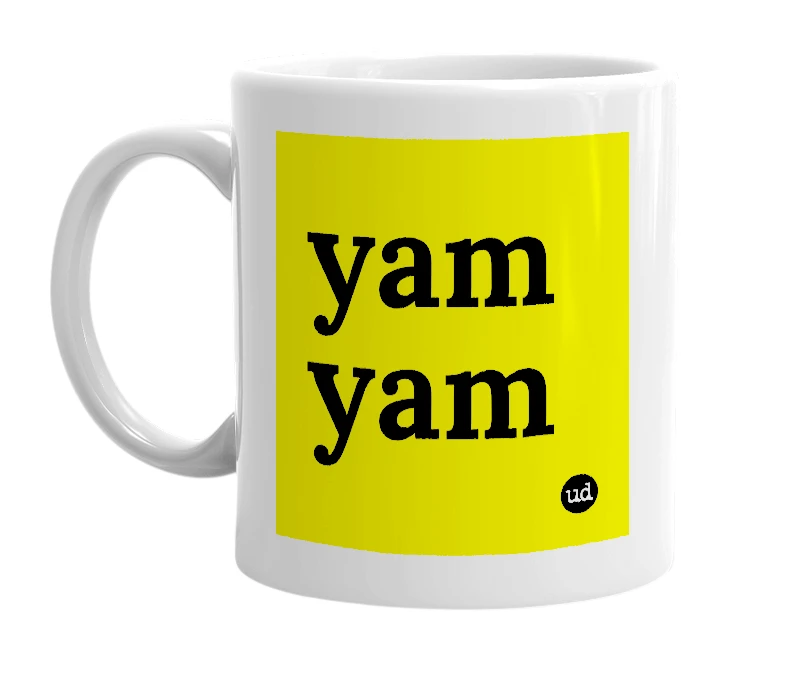 White mug with 'yam yam' in bold black letters