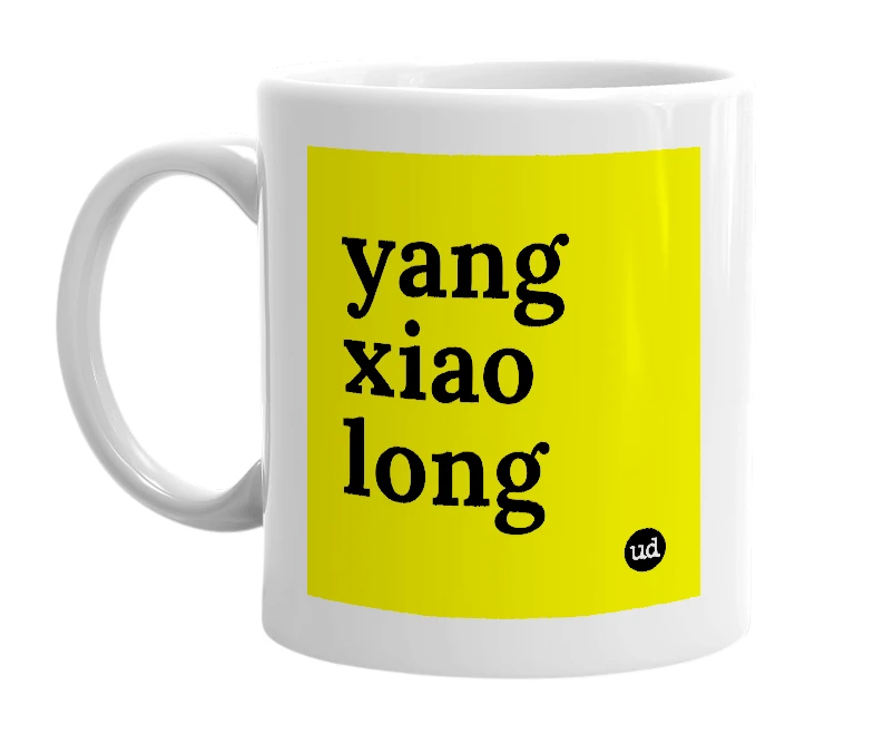 White mug with 'yang xiao long' in bold black letters