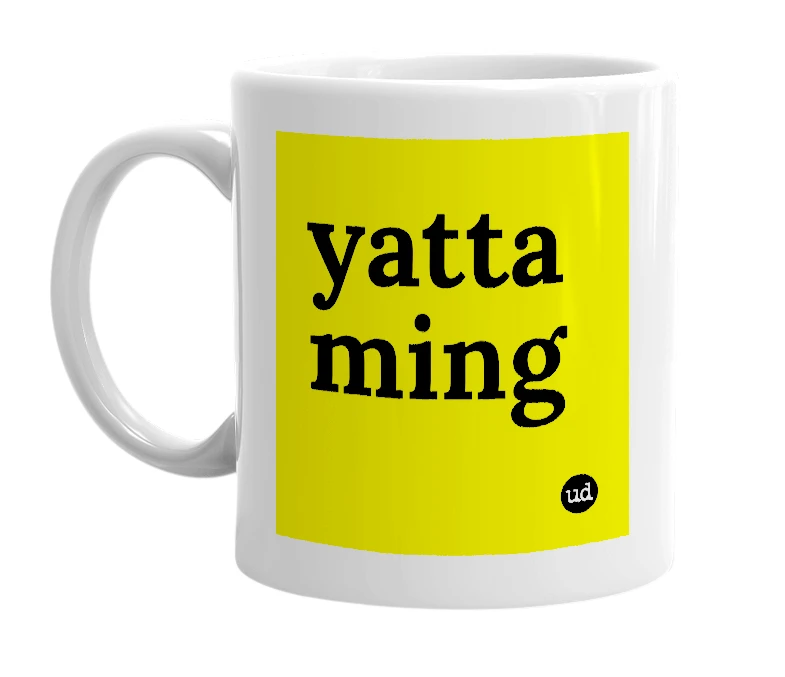 White mug with 'yatta ming' in bold black letters