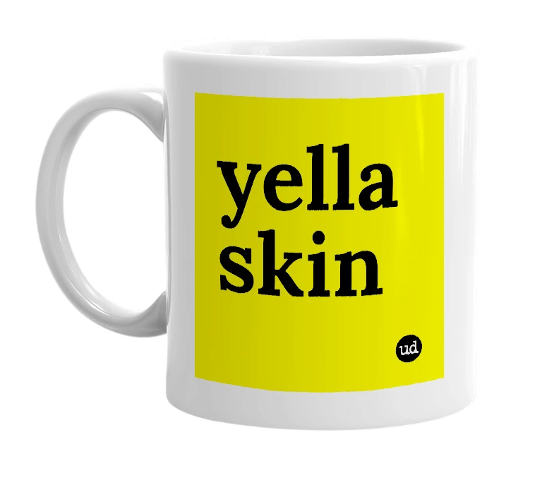 White mug with 'yella skin' in bold black letters