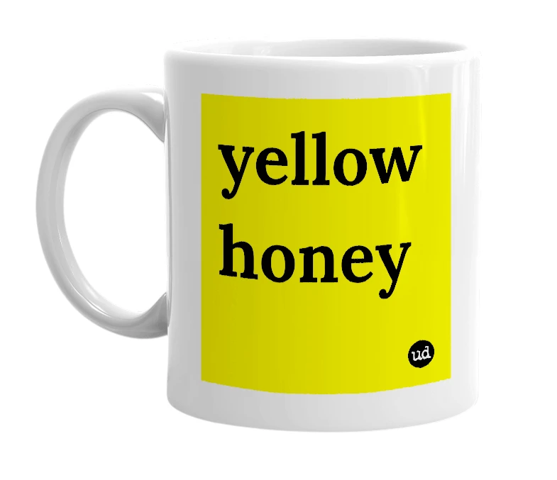 White mug with 'yellow honey' in bold black letters