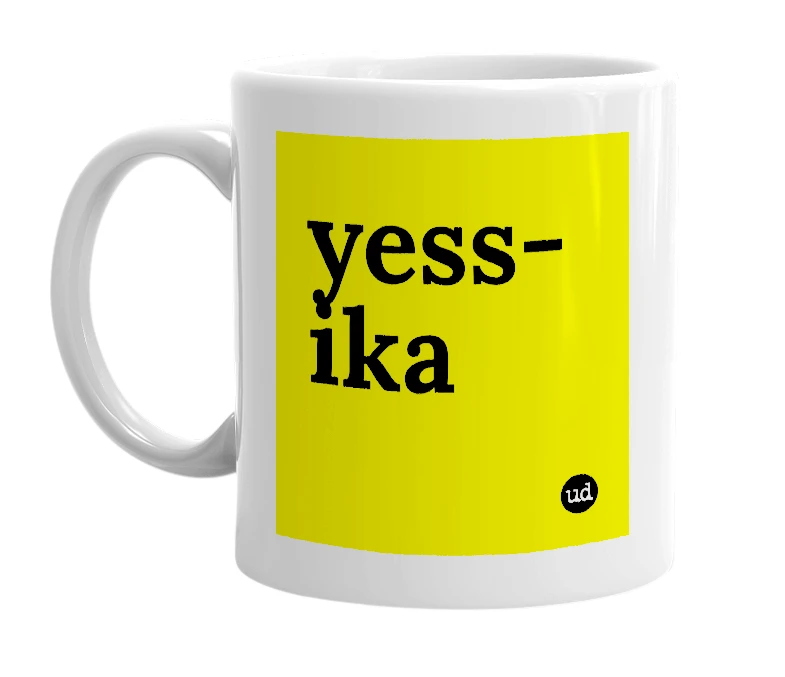 White mug with 'yess-ika' in bold black letters