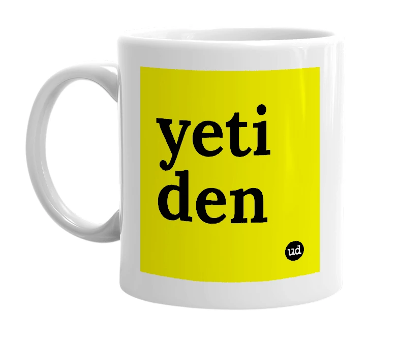White mug with 'yeti den' in bold black letters