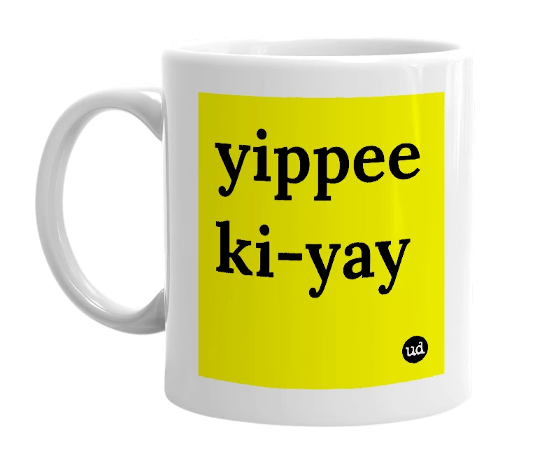 White mug with 'yippee ki-yay' in bold black letters