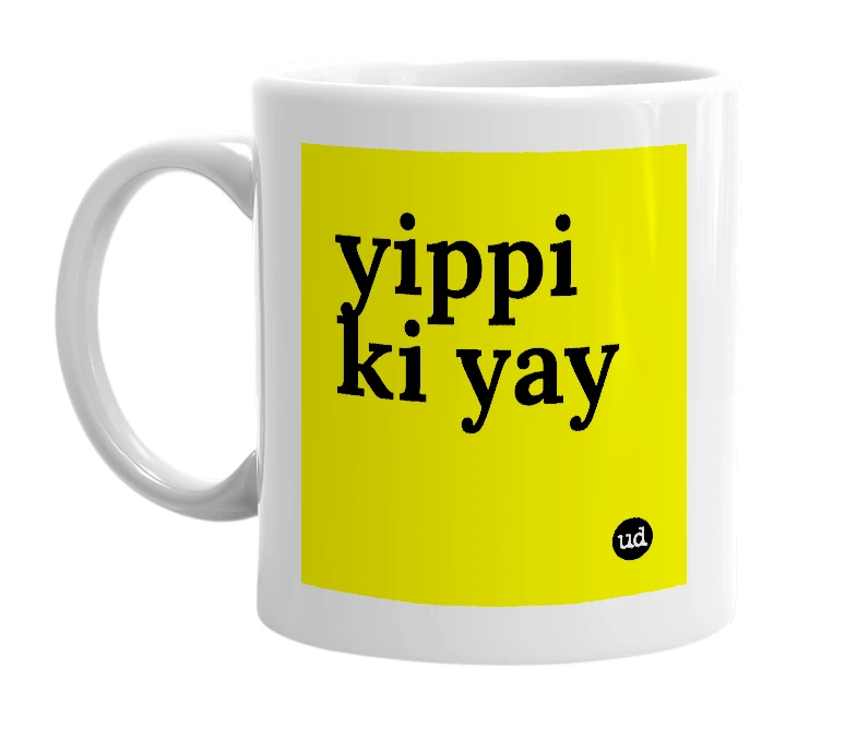 White mug with 'yippi ki yay' in bold black letters