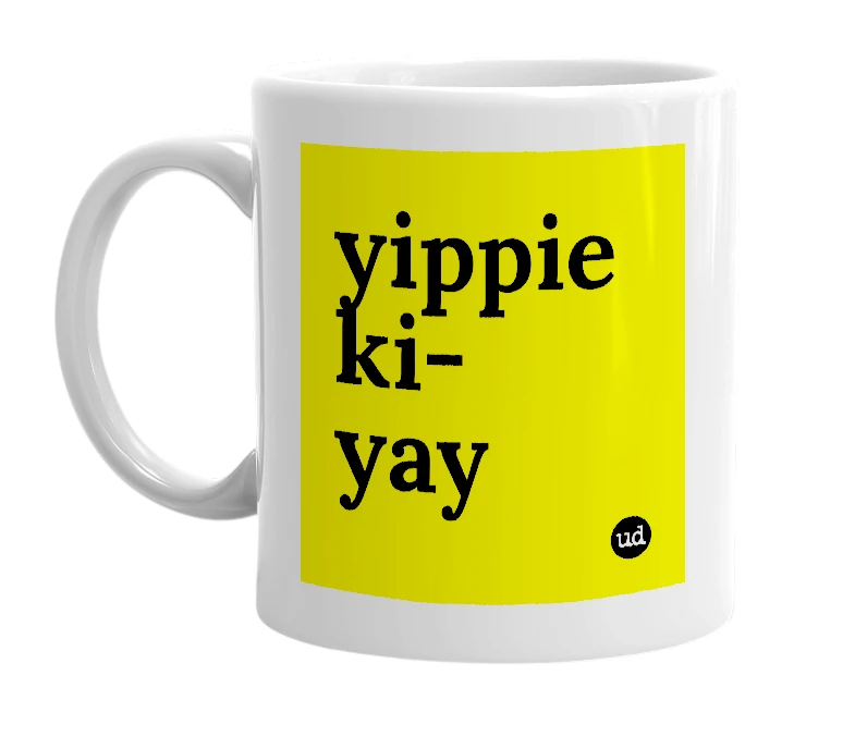 White mug with 'yippie ki-yay' in bold black letters