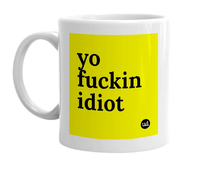 White mug with 'yo fuckin idiot' in bold black letters