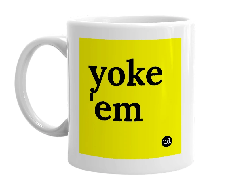 White mug with 'yoke 'em' in bold black letters