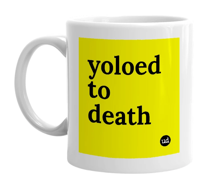 White mug with 'yoloed to death' in bold black letters