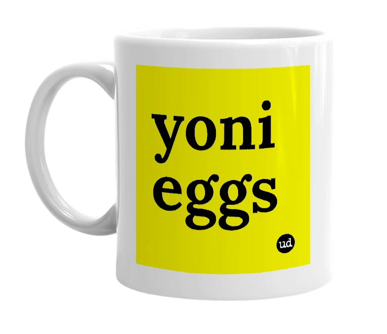 White mug with 'yoni eggs' in bold black letters
