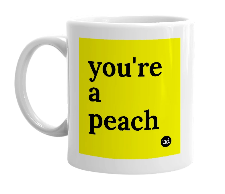 White mug with 'you're a peach' in bold black letters