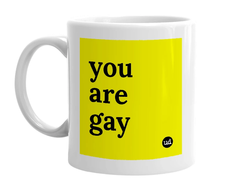 White mug with 'you are gay' in bold black letters