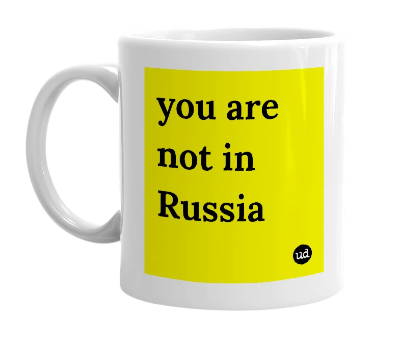 White mug with 'you are not in Russia' in bold black letters