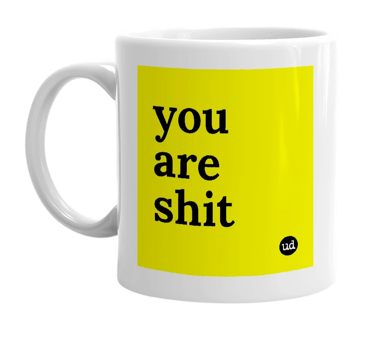 White mug with 'you are shit' in bold black letters