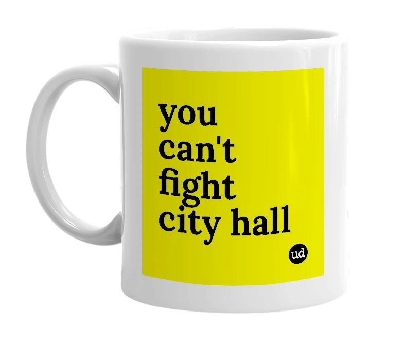 White mug with 'you can't fight city hall' in bold black letters