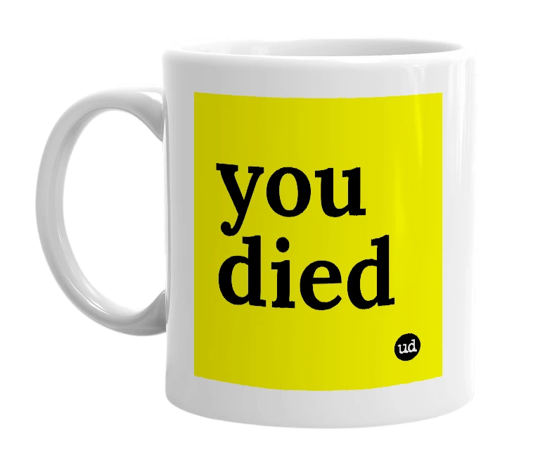 White mug with 'you died' in bold black letters