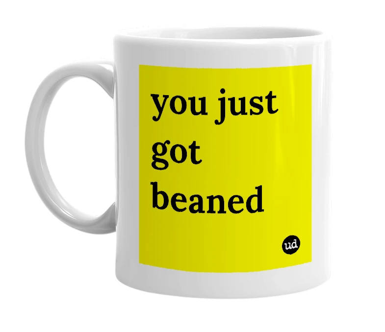 White mug with 'you just got beaned' in bold black letters