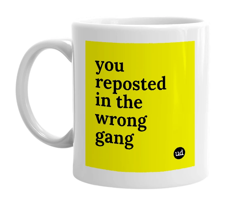 White mug with 'you reposted in the wrong gang' in bold black letters