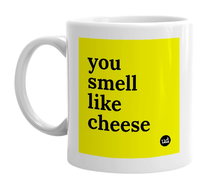 White mug with 'you smell like cheese' in bold black letters