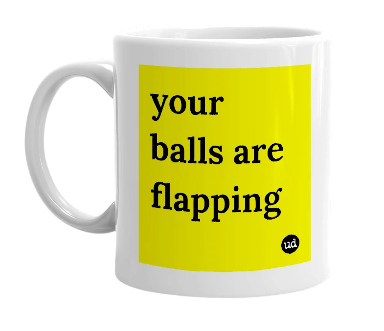White mug with 'your balls are flapping' in bold black letters