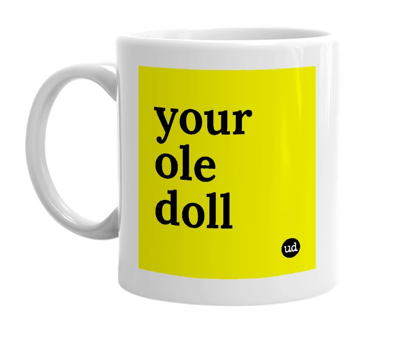 White mug with 'your ole doll' in bold black letters